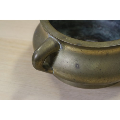 86 - A Chinese bronze two-handled censer, 5 1/2