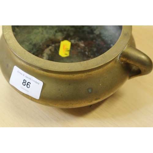 86 - A Chinese bronze two-handled censer, 5 1/2