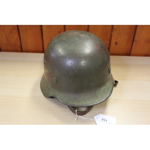 155 - A 1940 Wehrmacht steel helmet M35, with double decal, some rust, with leather liner and chin strap, ... 