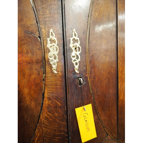 432 - An oak linen press with box and ebony strung cornice, enclosed two doors (missing internal drawers) ... 