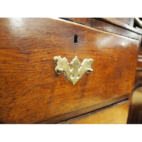 432 - An oak linen press with box and ebony strung cornice, enclosed two doors (missing internal drawers) ... 