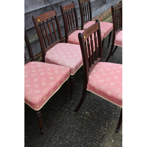 412 - A set of six Regency mahogany and line inlaid standard dining chairs with padded seats, upholstered ... 