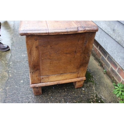 422 - An early 18th century Hanseatic planked oak coffer, the interior fitted candle box, on stile support... 