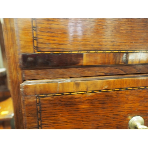 430 - An early Georgian oak, mahogany banded and box and ebony strung chest on chest, the upper section fi... 