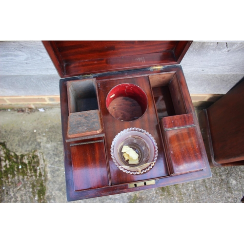 439 - A 19th century mahogany teapoy with three caddies and blending bowl (as found), on faceted column an... 