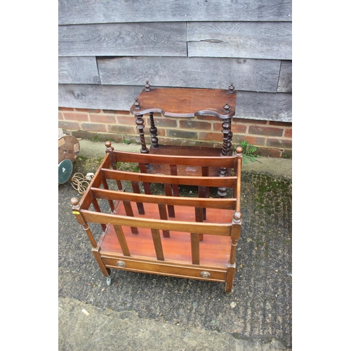 492 - An oak side cabinet with lift-up lid and drop-down compartment, on turned and stretchered supports, ... 