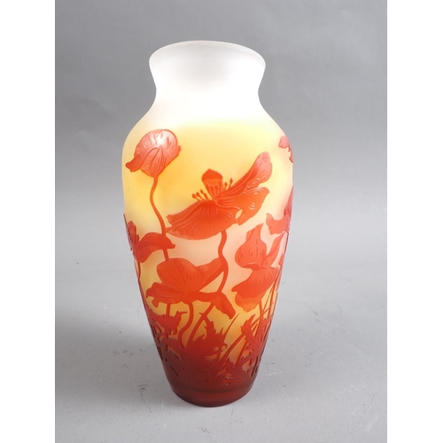 25 - An early 20th century Emile Galle cameo vase with flower and butterfly decoration on a yellow shaded... 