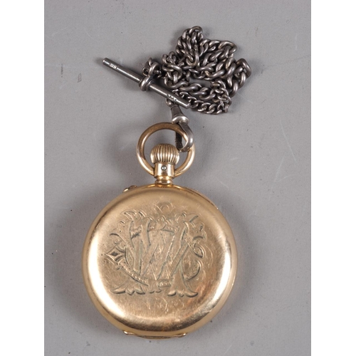 267 - A gentleman's pocket watch in rolled gold case and a silver chain