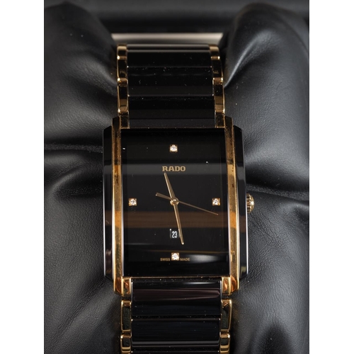 277 - A gentleman's Rado wristwatch, set four diamonds, in original box with spare link, guarantee cards a... 