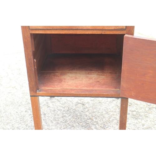 413 - A late 19th century mahogany and ebony strung washstand with hinged top over drawer and cupboard, 16... 