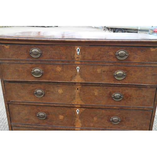 435 - A George III burr yew secretaire chest with fitted writing compartment, secret compartments, drawers... 