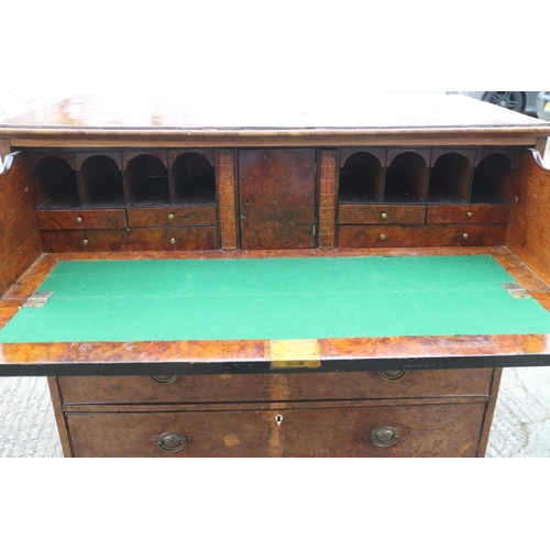 435 - A George III burr yew secretaire chest with fitted writing compartment, secret compartments, drawers... 