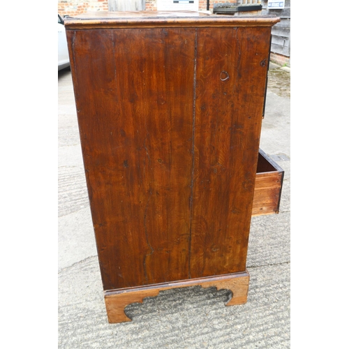 435 - A George III burr yew secretaire chest with fitted writing compartment, secret compartments, drawers... 