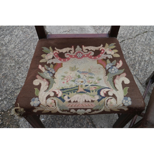 436 - A pair of late 18th century carved mahogany ladder back dining chairs with near contemporary gros po... 