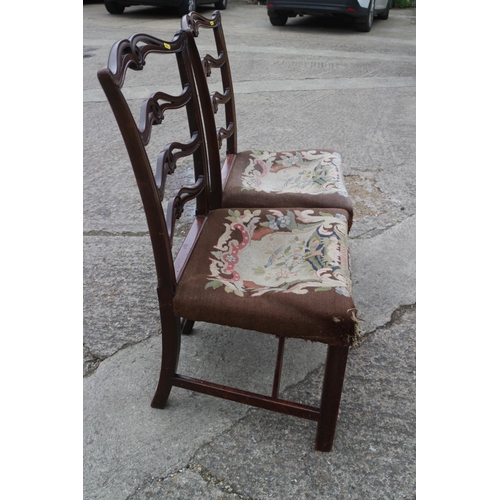 436 - A pair of late 18th century carved mahogany ladder back dining chairs with near contemporary gros po... 