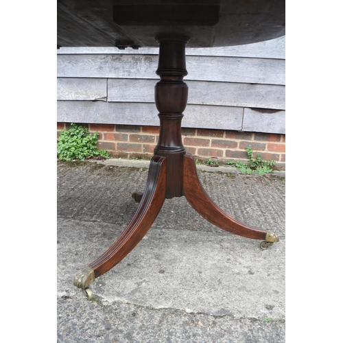 444 - A late 19th century mahogany double pedestal dining table, on vase turned columns and tripod splay s... 