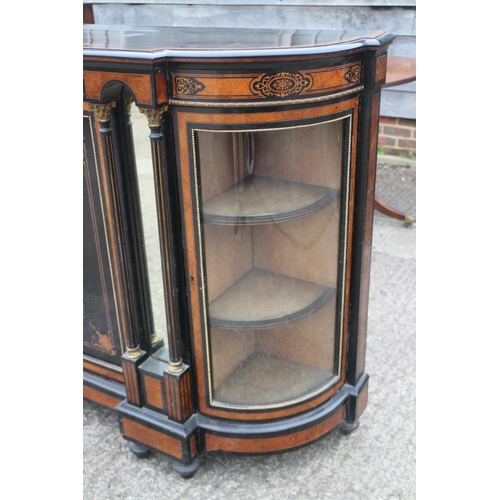 447 - A mid Victorian burr walnut and inlaid ebonised break bowfront credenza enclosed central door, inset... 