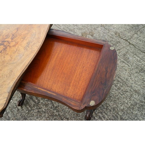 451 - A 19th century burr walnut serpentine fold-over top card table, on twist turned and stretchered spla... 