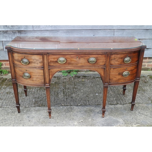 452 - A George III mahogany break bowfront sideboard, fitted cupboard, centre drawer and cellarette (no li... 