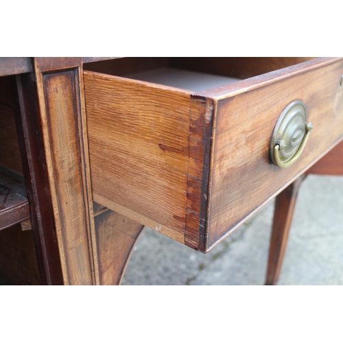 452 - A George III mahogany break bowfront sideboard, fitted cupboard, centre drawer and cellarette (no li... 