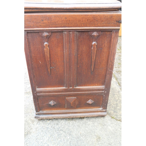 455 - An early 18th century oak mule chest with applied mouldings and arcaded front over one long drawer a... 