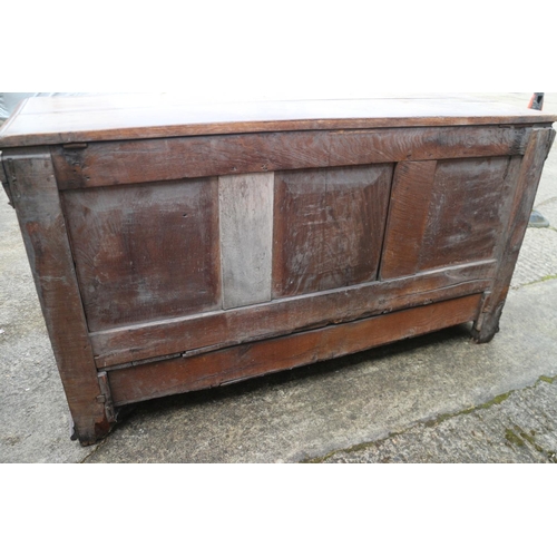 455 - An early 18th century oak mule chest with applied mouldings and arcaded front over one long drawer a... 