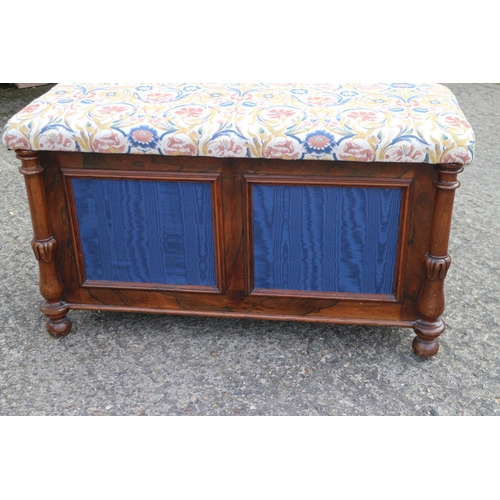 456 - A Regency rosewood box seat ottoman with fabric panels, on turned and castored supports, 34