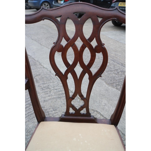 459 - A pair of late 19th century mahogany carver dining chairs of Chippendale design with drop-in seats, ... 