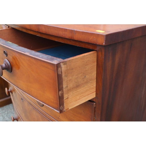 461 - A Victorian mahogany bowfront chest of two short and three long drawers with turned knob handles and... 