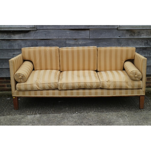 494 - A Howard style Regency design three-seat square arm sofa with loose seat and back cushions, on squar... 