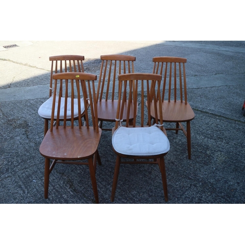 498 - A set of five 1970s beech spindle back dining chairs with panel seats