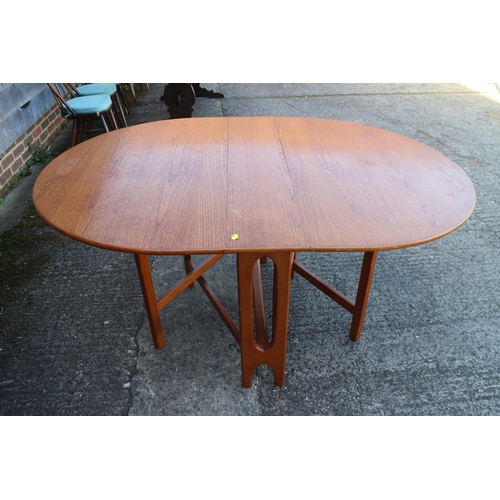 499 - A 1960s oak deep drop leaf oval dining table, 60