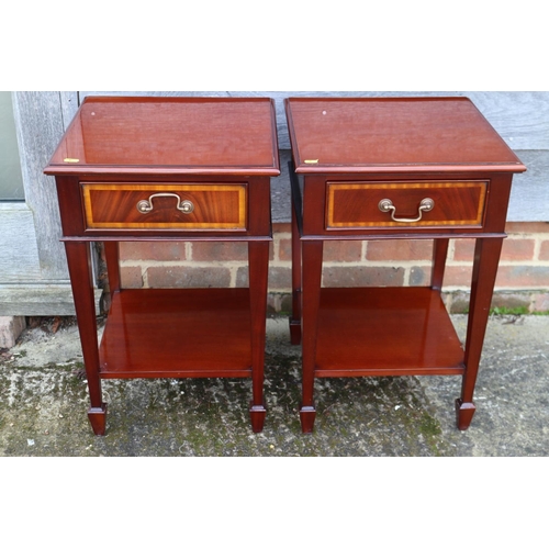 505 - A pair of mahogany two-tier lamp tables, fitted drawers, on square taper supports, 16