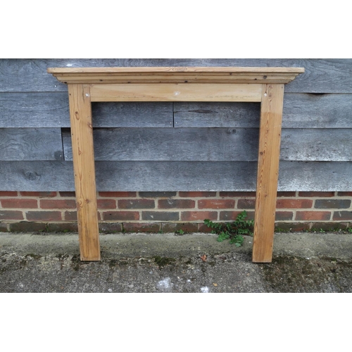 607 - A waxed pine fire surround, 45