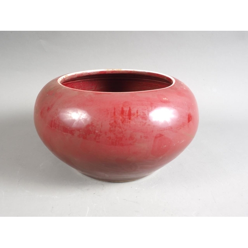 76 - A Chinese sang de boeuf glazed bowl, 9