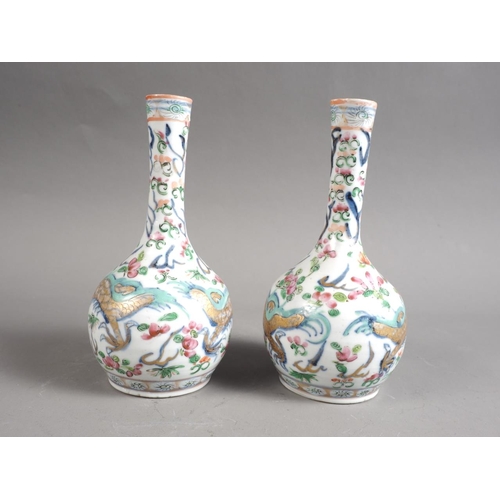 80 - A pair of Chinese porcelain and gilt dragon decorated bottle vases, 6 1/4