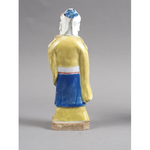 82 - A Chinese polychrome enamel decorated figure, 8