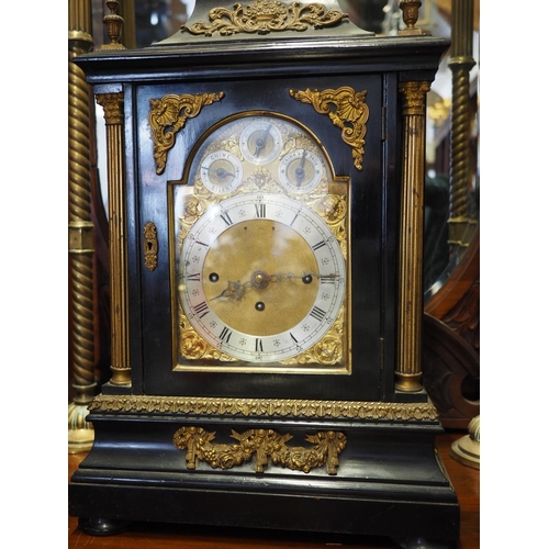 111 - An ebonised and gilt metal mounted bracket clock with eight-day striking and chiming movement on eig... 