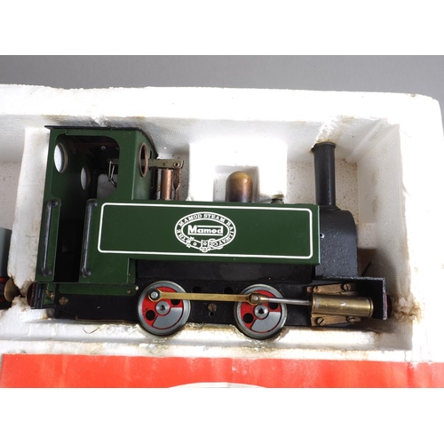 143 - The Mamod steam railway, in original fitted box, and an additional guard's wagon, in original box