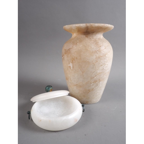 176 - An Egyptian alabaster jar, 7 1/2