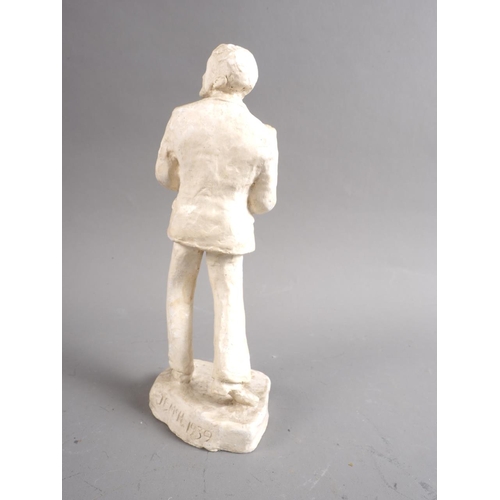 185 - J E McH, 1939: a plaster figure of a dancer, 8 1/2