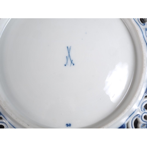 4 - A pair of Meissen porcelain blue and white reticulated dishes with floral decoration, 10 1/2