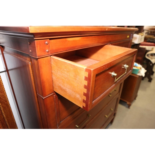 525 - A cherrywood chest of two short and three long drawers, on square taper supports, 40