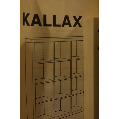 527 - An Ikea Kallax storage unit with numerous drawers, 55