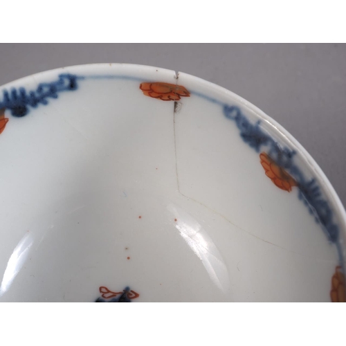 71 - A Chinese yellow glazed two-handled cup with incised beast decoration and six-character mark to base... 