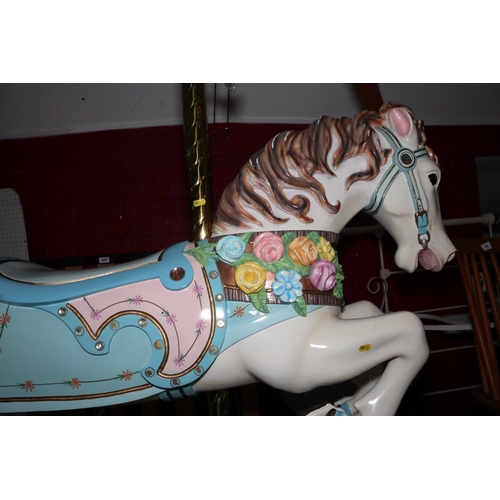 186 - An American carved wood and painted galloper/rocking horse by S&S wood carvers, Santa Anna Calif... 