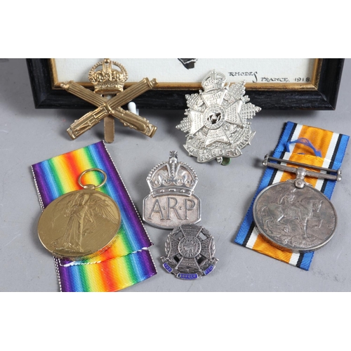 288 - Two WWI medals, awarded to Private T B Todd, together with two regimental cap badges and watercolour... 