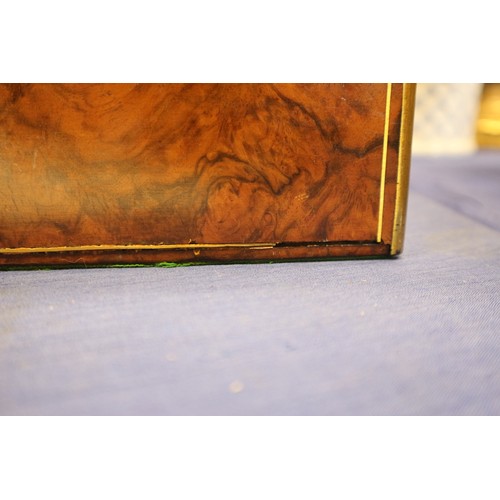 137 - A 19th century burr walnut and brass mounted writing box with fitted interior and three 