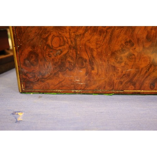 137 - A 19th century burr walnut and brass mounted writing box with fitted interior and three 