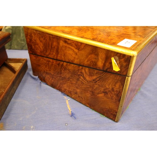 137 - A 19th century burr walnut and brass mounted writing box with fitted interior and three 